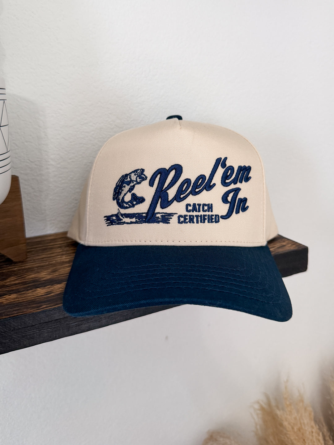 Reel Em&