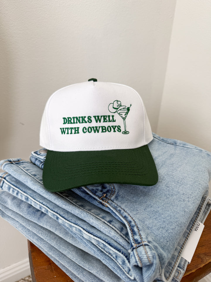 Drinks Well With Cowboys Trucker Hat
